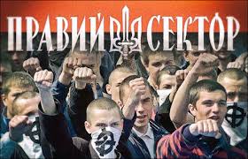 Right Sector demonstrators at the Maidan Square. Skin heads of Right Sector with their emblem.