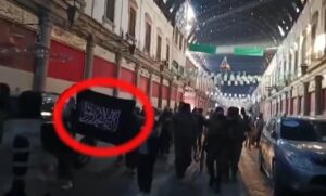 Al-Qaeda off-shoot Mujahideen in the heart of Damascus, bearing the flag of al-Qaeda, the God Father Group that spawn ISIS, both currently “allies” of the US, chanting, “Our revolution is Islamic!”